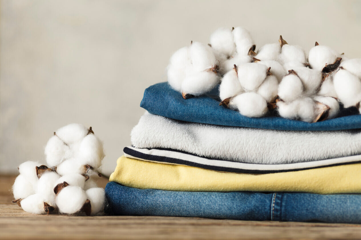 A stack of organic clothing and cotton colors. Eco friendly fabr