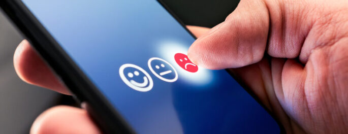 Clicking a negative experience icon on smartphone